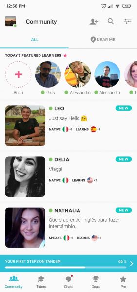 Screenshot of the Community section of the Tandem app. The image shows a list of profiles with pictures and short bios.