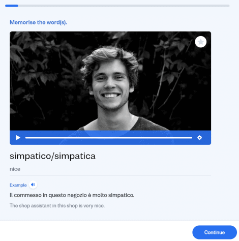 Screenshot of the exercise where the user is supposed to remember the words. In this example, the Italian word is "simpatico/simpatica" and there is an image of a smiling man.