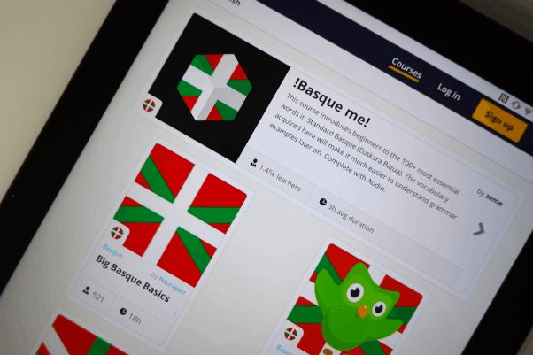 A tablet is turned on and showing on list of Basque courses on the Memrise website 