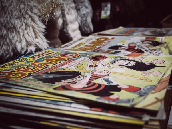 Piles of Beano magazine available for sale