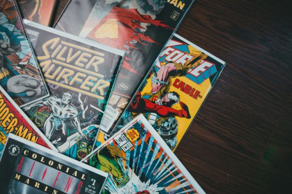 Pile of comics on a table 